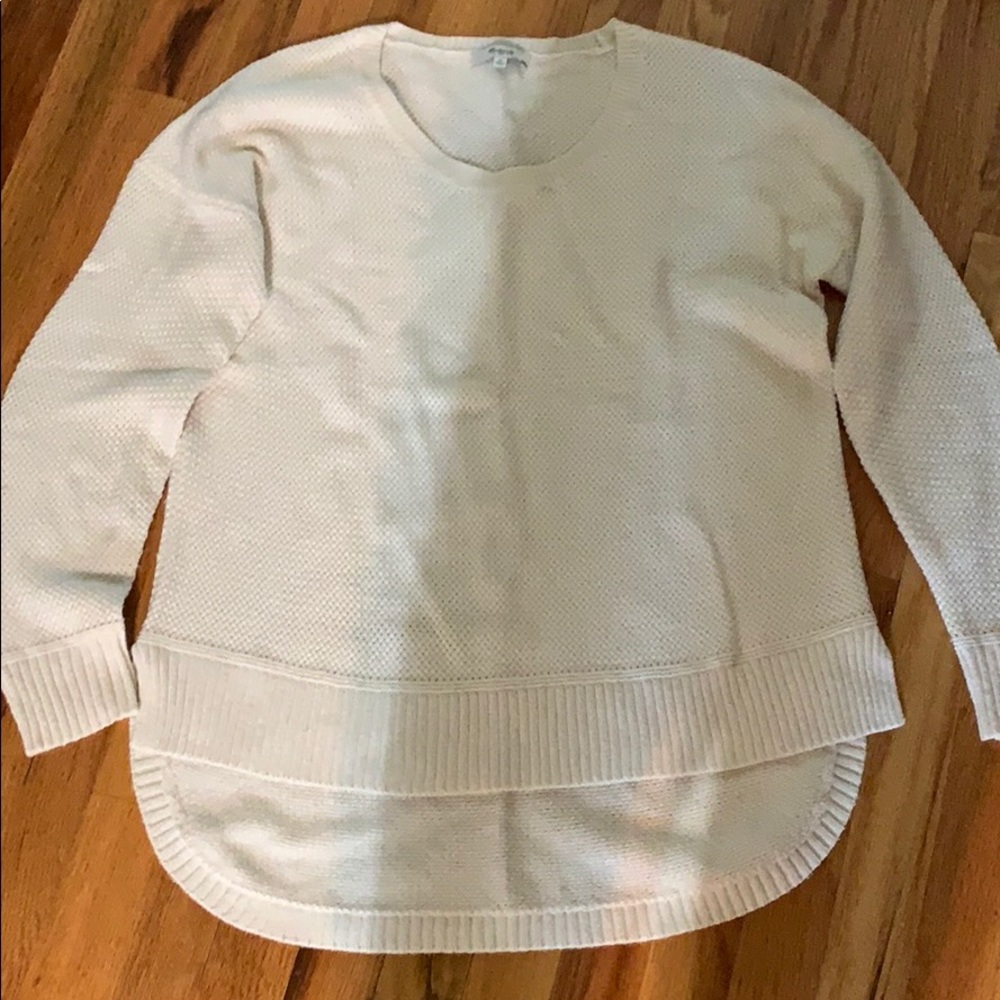 Made we all cream colored sweater. Medium.